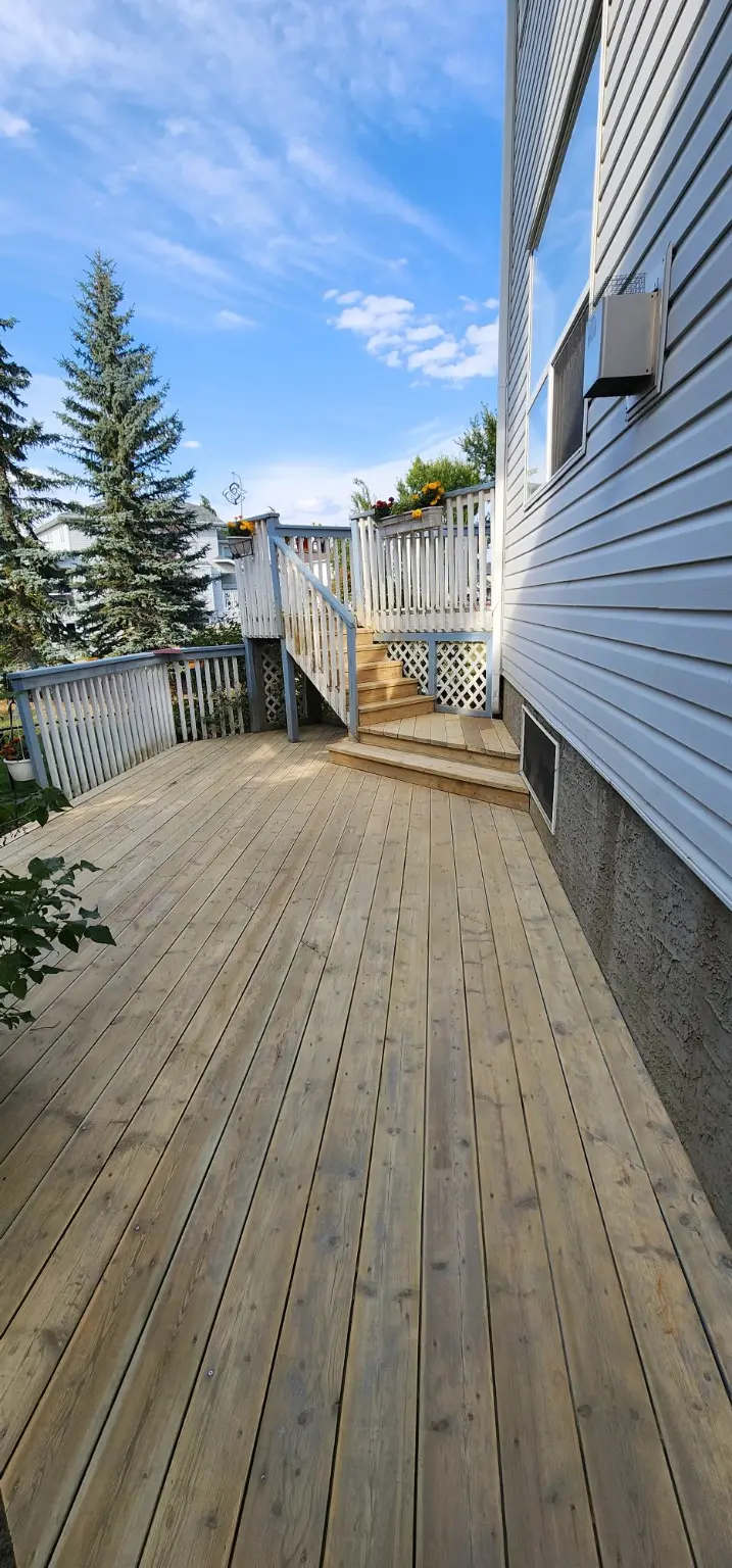 Cleaned deck boards ready for refinishing in Calgary by White5