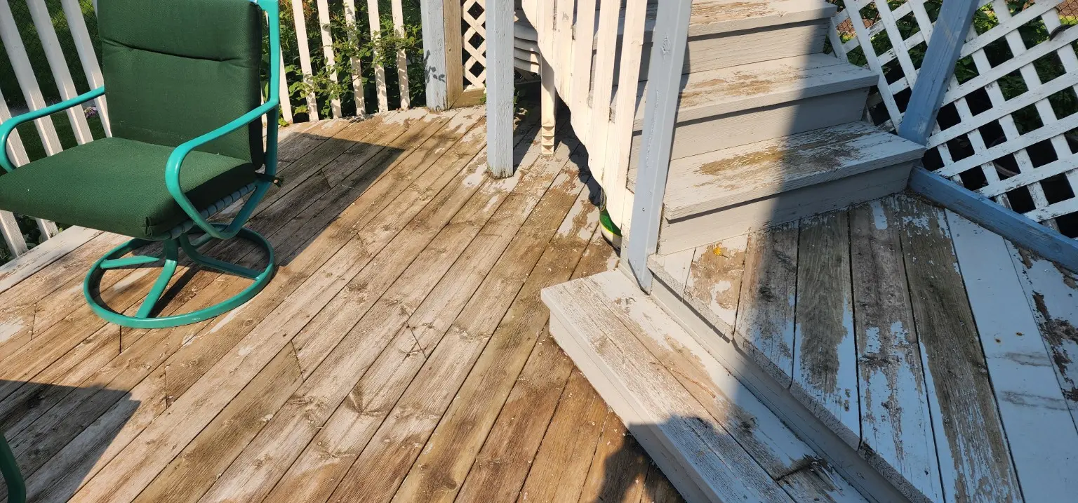 Deck cleaning and sanding preparation by White5 in Calgary