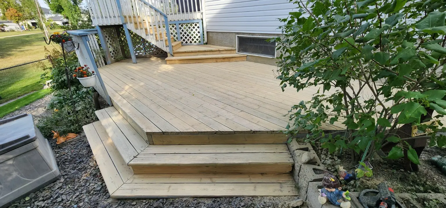 Cleaned wood deck and stairs during restoration in Calgary