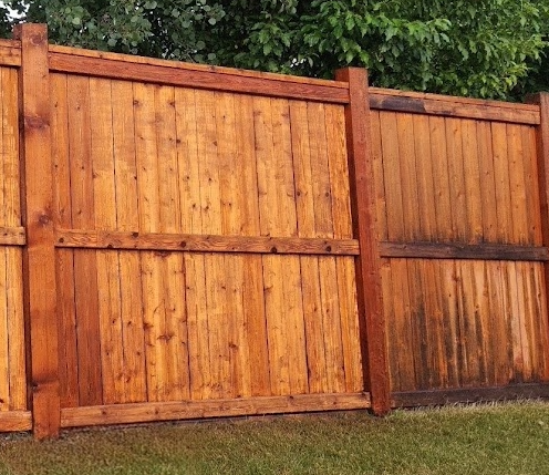 Before and after fence power washing by White5 in Calgary